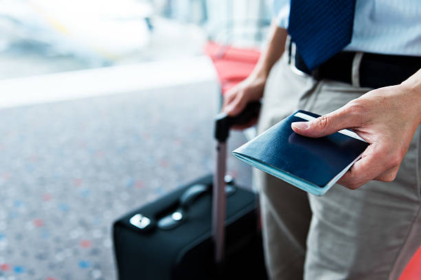 ビジネストラベル - travel passport suitcase journey ストックフォトと画像