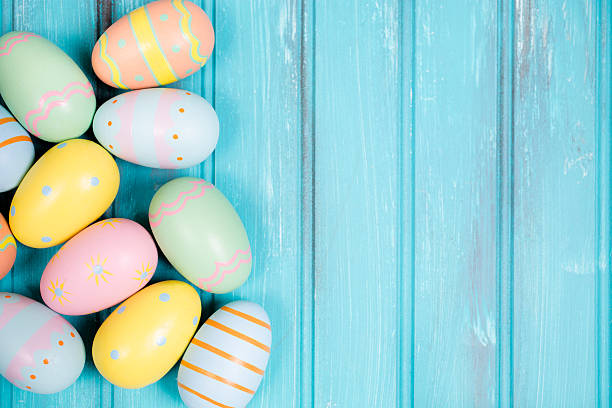 istock Easter eggs on blue wood. Seasonal background frame. 511060778