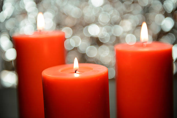 istock aromatic orange candle, bokeh background 511061628