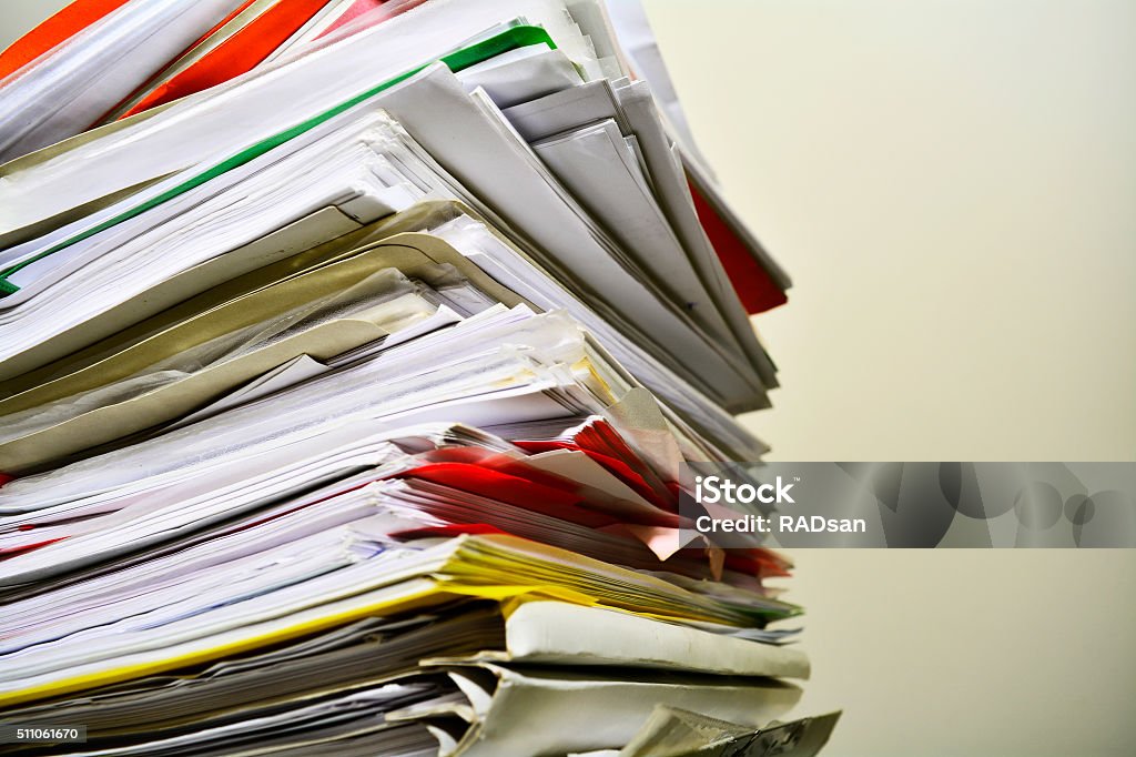 Stack of files on his desk Stack Stock Photo