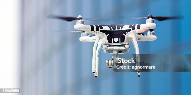 Hovering Drone That Takes Pictures Stock Photo - Download Image Now - Drone, Camera - Photographic Equipment, Unmanned Aerial Vehicle