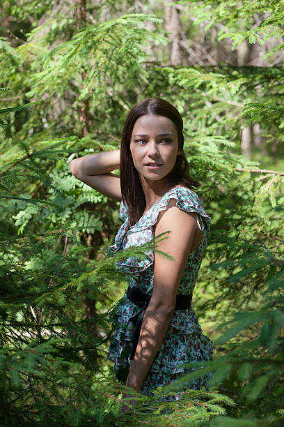 istock girl in fir-tree wood 511066826