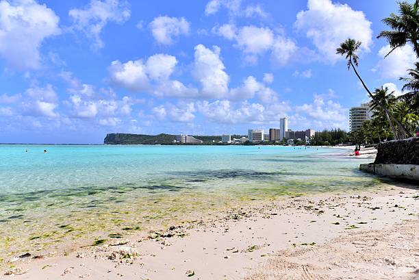istock Tumon Bay with beautiful sandy beach and blue sky 511067040