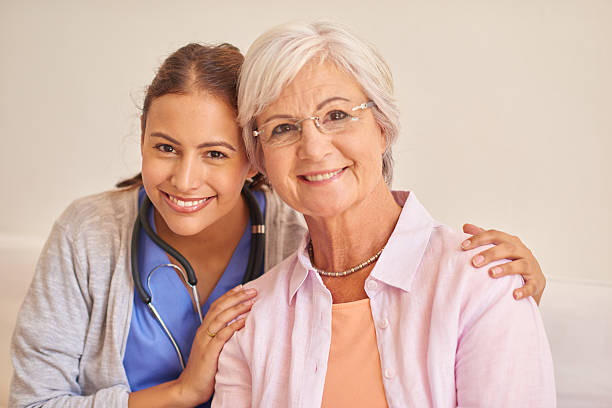 istock Senior female patient with nurse 511067194