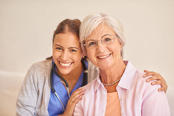 istock Senior female patient with nurse 511067752