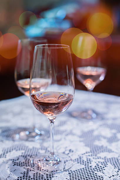 istock Glasses of red wine on table 511068692
