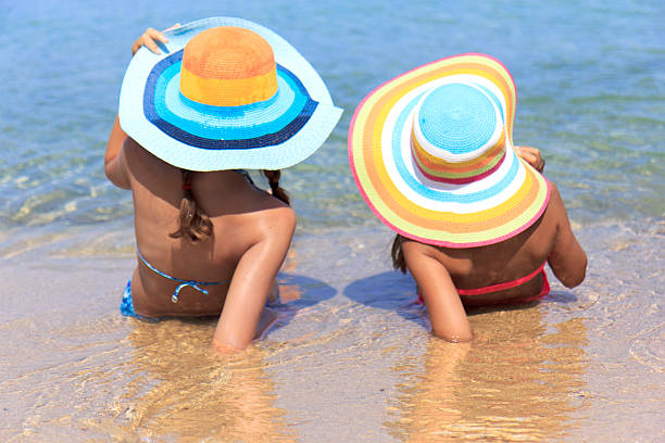 istock Girls on the beach 511068824