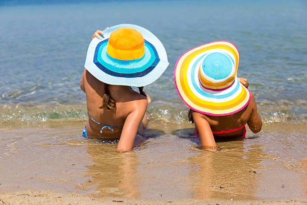 istock Girls on the beach 511068850