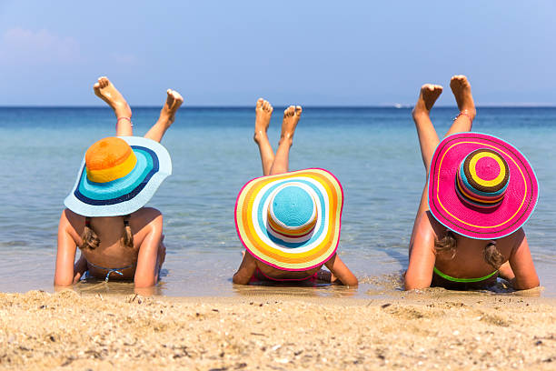 istock Girls on the beach 511068978
