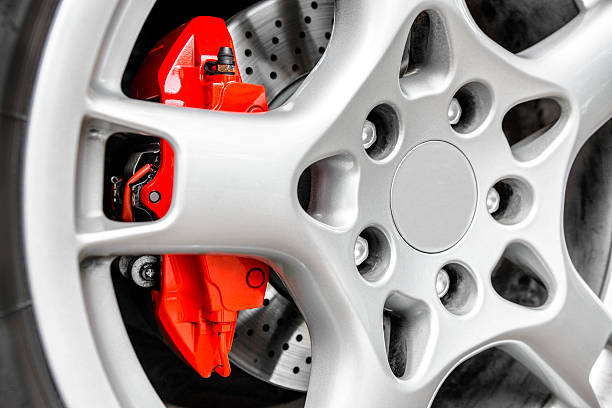 istock Red brake caliper and alloy 511091943