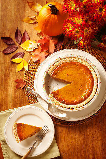 istock Autumn Scene with Pumpkin Pie Still Life Vertical 511093327