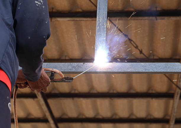 istock electric welding connecting construction metal 511094403