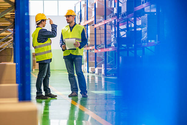 istock Coworkers in Warehouse 511096275