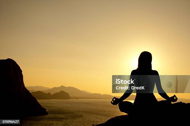 Yoga Lotus Position Silhouette At Sunrise Stock Photo - Download Image Now - Adult, Adults Only, Back Lit