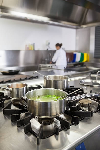 istock Several pots cooking on hotplate 511097437