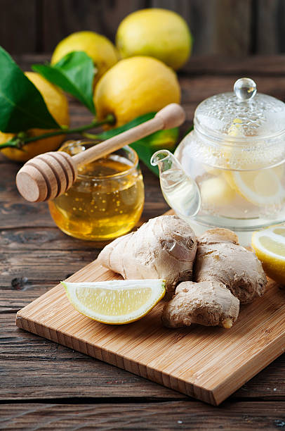 istock Cocktail with ginger, lemon and honey on the wooden table 511102620