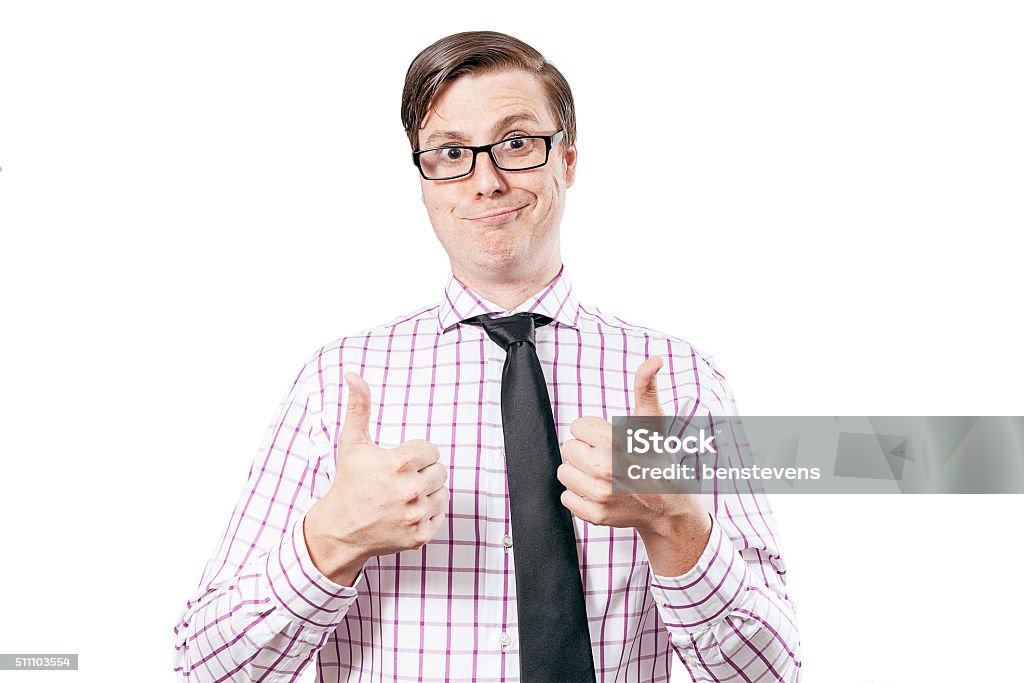 Happy smiling geek isolated on white with two thumbs up Happy smiling geek isolated on white with two thumbs up. He's wearing a tie and striped shirt. Thumbs Up Stock Photo
