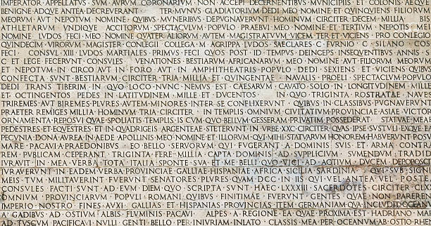 istock Ancient Latin Inscription on Roman wall 511103592