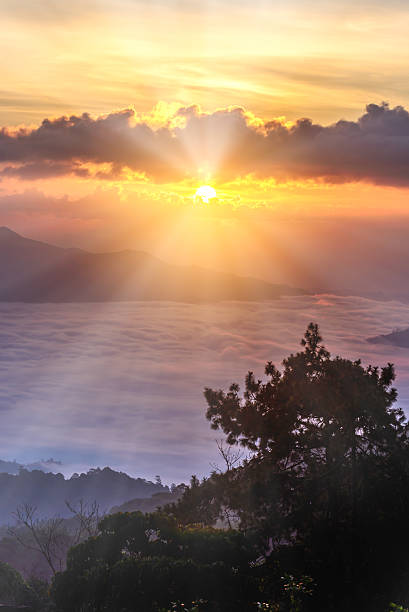 istock Silhouette of Sunrise and mist with mountain. 511103726