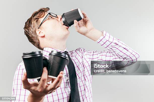 Thristy Business Nerd Drinking Coffee Stock Photo - Download Image Now - Caffeine, Excess, Coffee - Drink