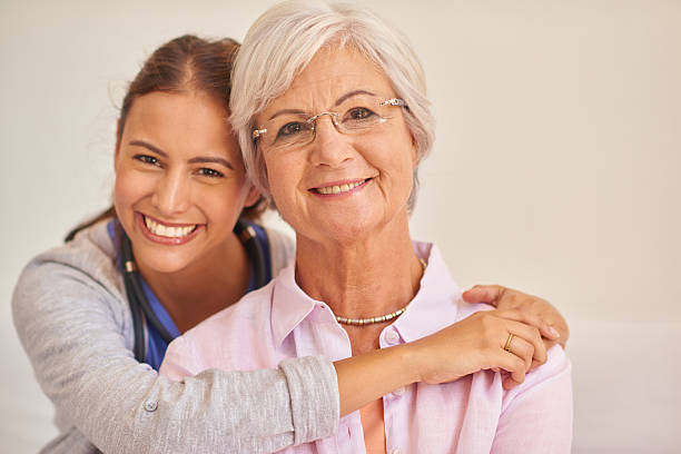 istock Senior female patient with nurse 511104790