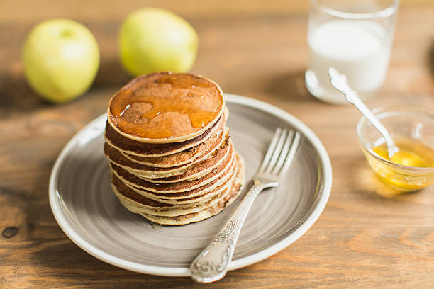 istock Delicious pancakes close up, with honey 511106578