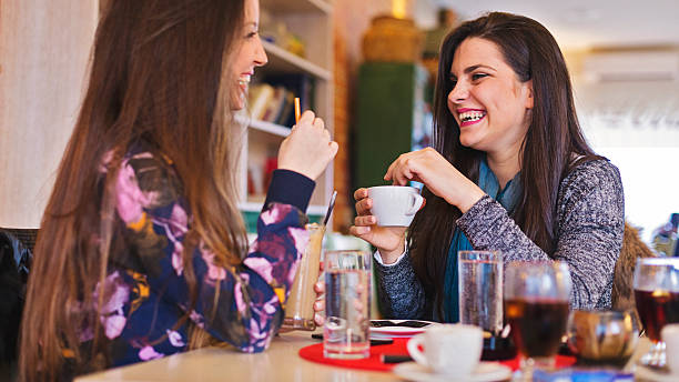 istock Two women sitting in cafe 511110600