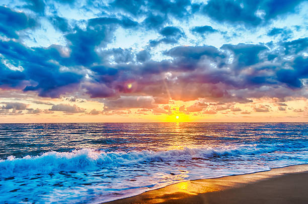 istock Sunset on the sea with a scenic cloudy sky 511110972