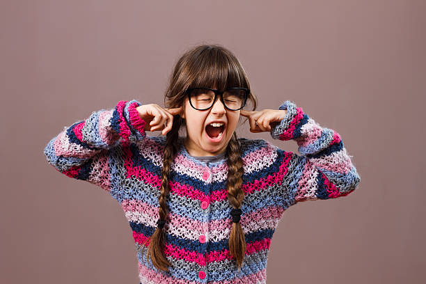 istock Furious little nerdy girl doesn't want to listen 511120146