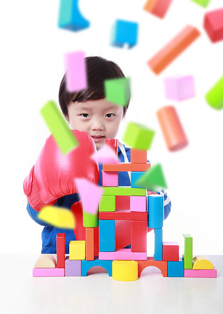 Cute asian Children playing with blocks