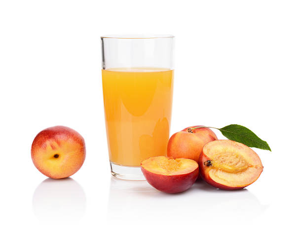 istock Close-up shot sliced nectarines with juice and leaf 511134141