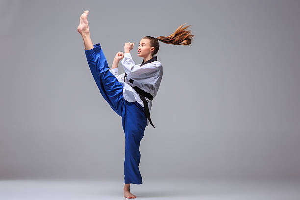 istock The karate girl with black belt 511190340