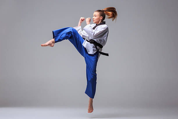 istock The karate girl with black belt 511190444