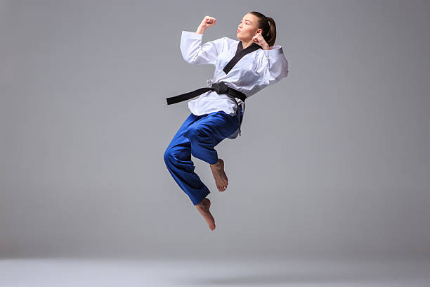 istock The karate girl with black belt 511190540