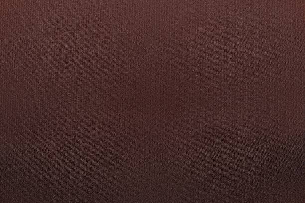 istock textured background from textile fabric of dark brown color 511191216
