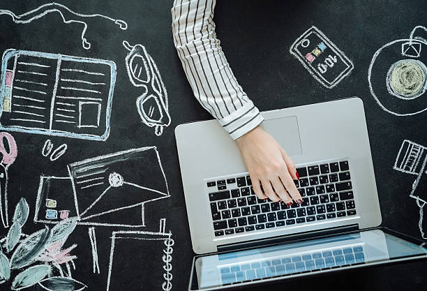 istock Flat lay of laptop on chalkboard table. Background 511191318