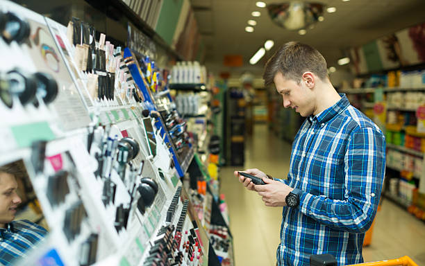 istock man standing near beauty stand 511192270