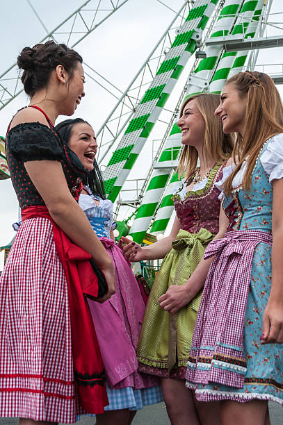 istock Attractive and joyful woman at German Beer Fest with traditional dirndl 511193384