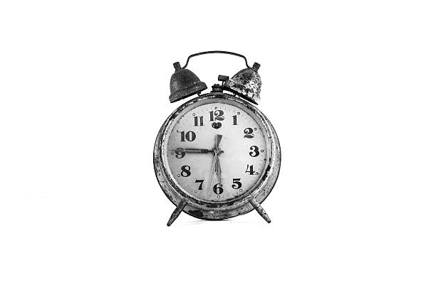 istock Vintage alarm clock and old and rust gold alarm 511193948