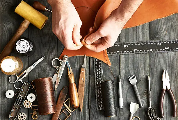 Photo of Man working with leather