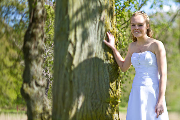 Girl the day of the confirmation in spring in denmark. Shot with a tilt and shift lense