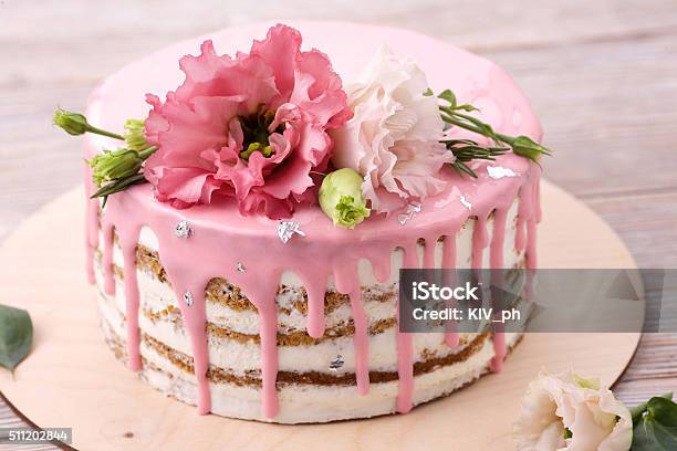 Carrot Cake With Pink Glaze Stock Photo - Download Image Now - Cake, Flower, Pink Color