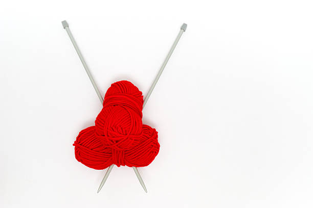 istock Balls of yarn with knitting needles 511203926