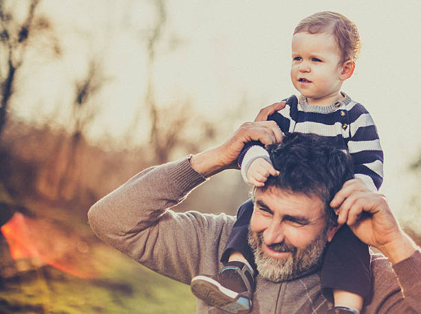 istock Happy grandfather and grandson 511205288