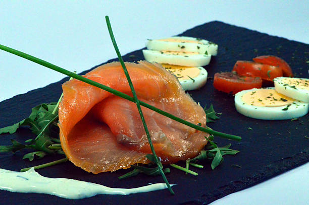 istock A slice of salmon smokes. 511205892