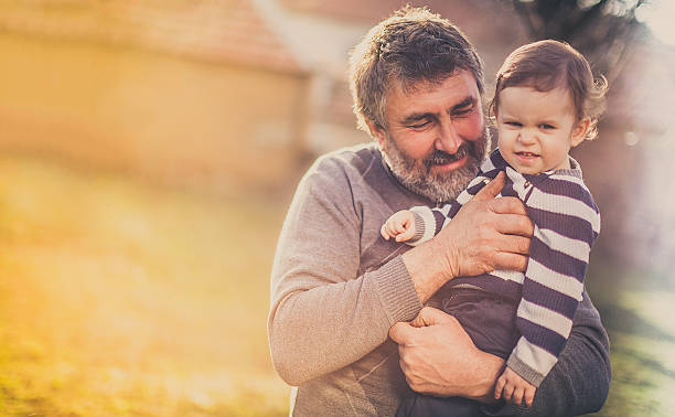 istock Happy grandfather and grandson 511207028