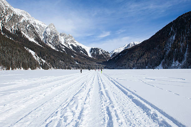 Frozen lake Antholz Anterselva in Italian alps winter, Tirol, Italy stock photo