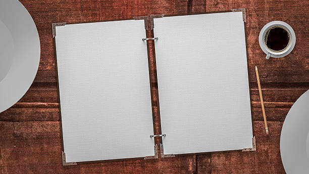 paper and plates on a old wooden table