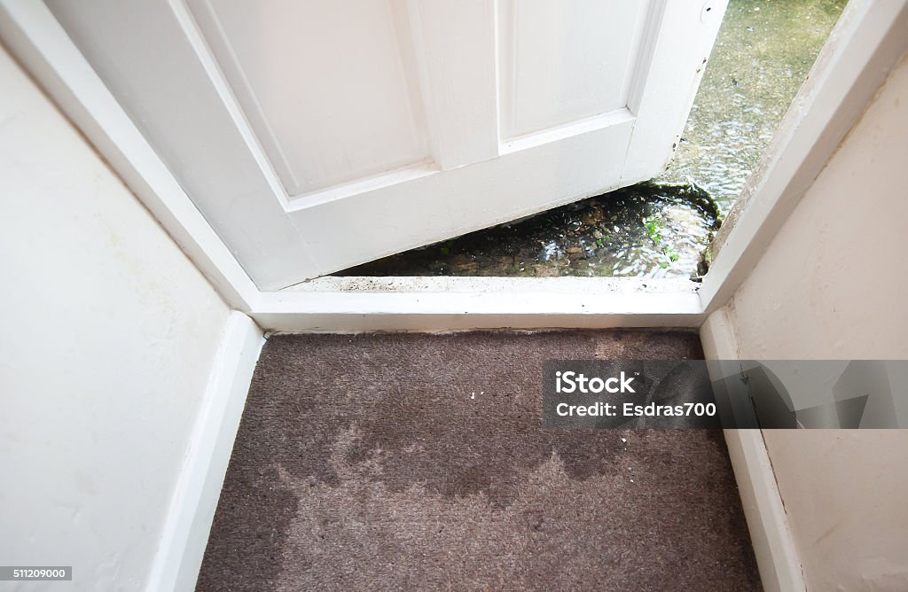 flooding entrance of a House fully flooded Flood Stock Photo