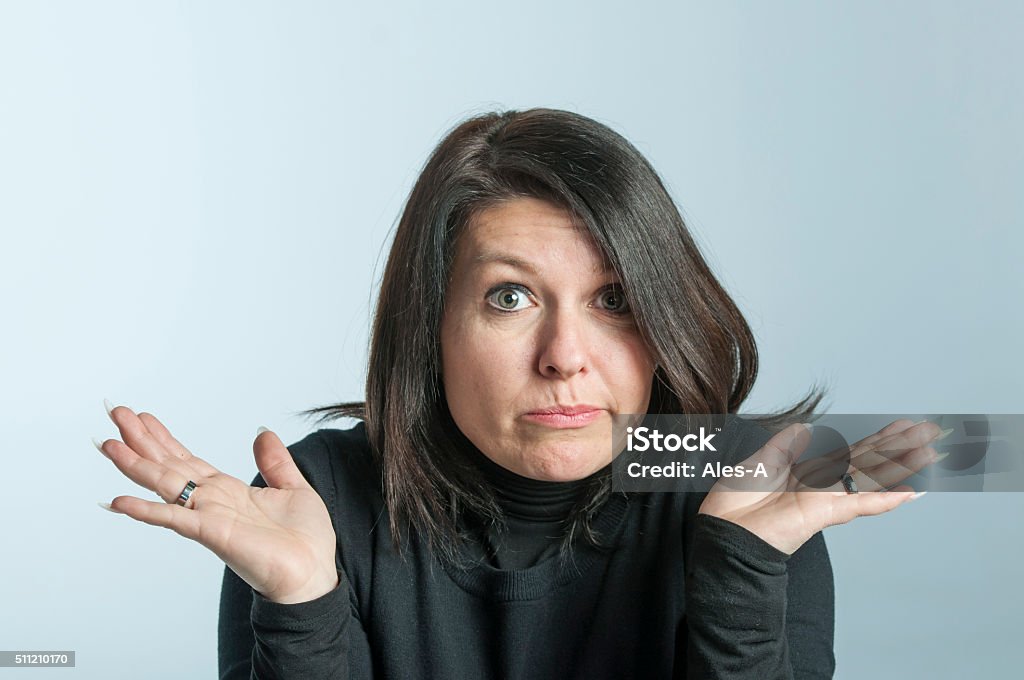 I don't know Portrait of woman with no answer Women Stock Photo